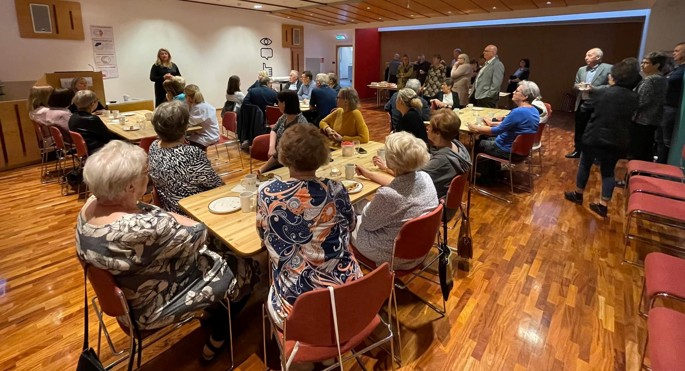 Former employees that have retired came to visit and had morning coffee